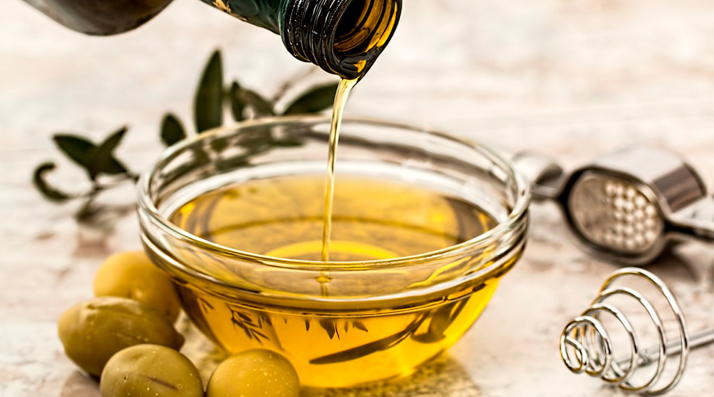 What is the density of olive oil?